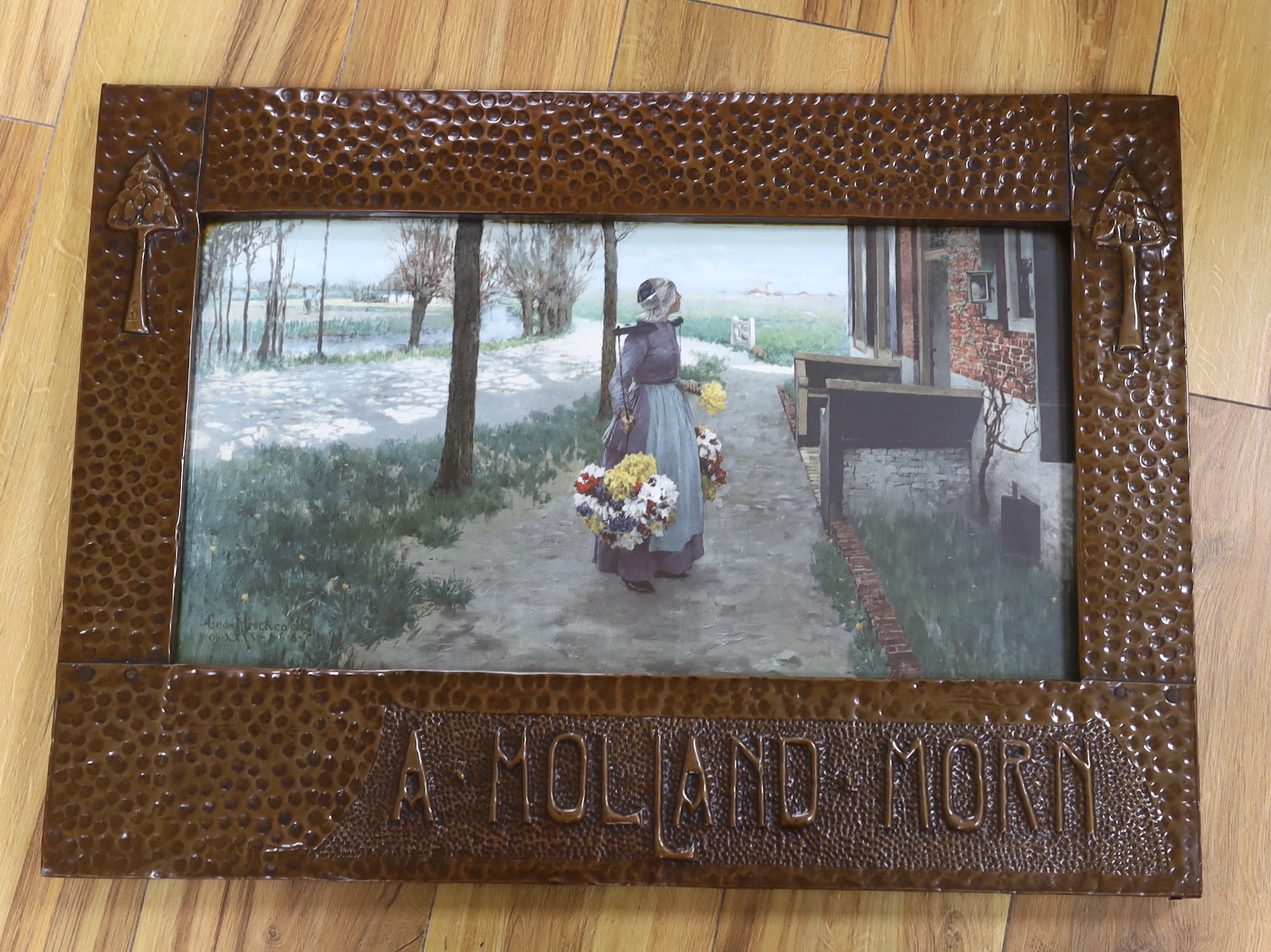 An Arts & Crafts embossed copper frame, housing a colour print after George Hitchcock, American (1850-1913), 'A Holland Morn', overall 46 x 63cm